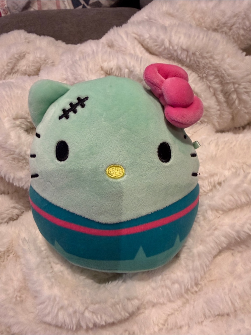Squishmallows Hello Kitty Mint Green Plush with Pink Bow and Teal Base